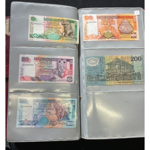 179 - World Bank note collection. A folder containing notes from the UK, various 10 shillings and £1 notes... 