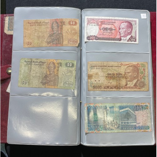 179 - World Bank note collection. A folder containing notes from the UK, various 10 shillings and £1 notes... 