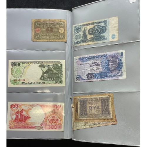 179 - World Bank note collection. A folder containing notes from the UK, various 10 shillings and £1 notes... 