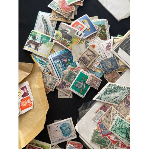 187 - Large Collection of loose world stamps. To include, British empire, commonwealth and independant sta... 