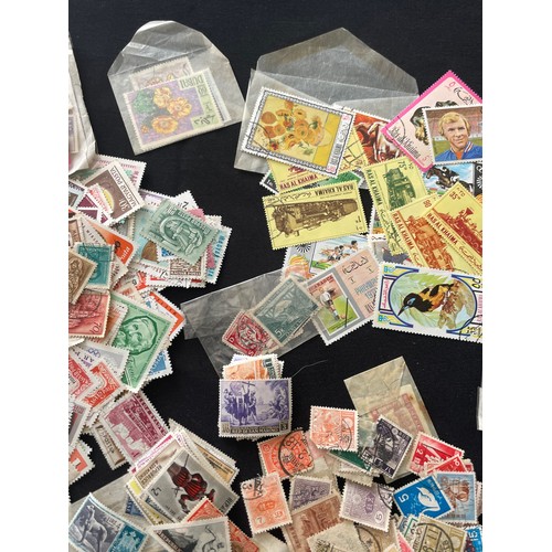 187 - Large Collection of loose world stamps. To include, British empire, commonwealth and independant sta... 