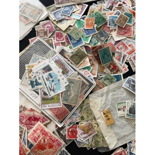 187 - Large Collection of loose world stamps. To include, British empire, commonwealth and independant sta... 