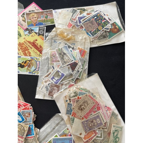 187 - Large Collection of loose world stamps. To include, British empire, commonwealth and independant sta... 