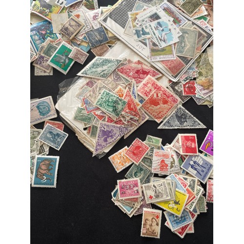 187 - Large Collection of loose world stamps. To include, British empire, commonwealth and independant sta... 