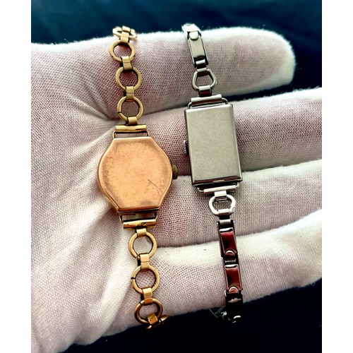 137 - Two ladies cocktail watches, post war period. A 9ct gold watch with rolled gold bracelet and a stanl... 