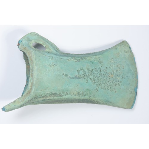 23 - European Bronze Age looped and socketed axe head. Circa 1200-800 BCE. Copper-alloy, 177g. 101mm. A f... 