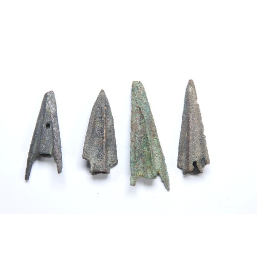 27 - Anatolian cast bronze trilobate arrowheads (5). Circa 10th-6th Century BCE. Socketed with three shar... 