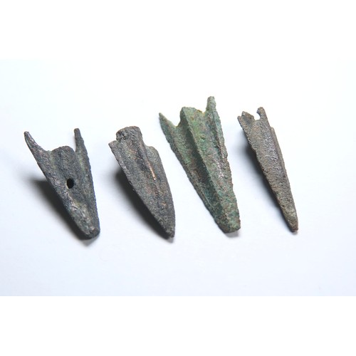 27 - Anatolian cast bronze trilobate arrowheads (5). Circa 10th-6th Century BCE. Socketed with three shar... 