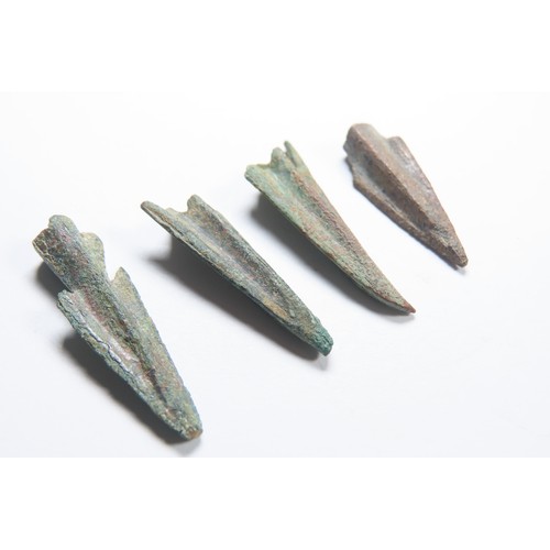 28 - Anatolian cast bronze trilobate arrowheads (5). Circa 10th-6th Century BCE. Socketed with three shar... 