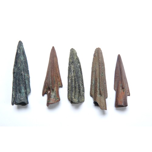 29 - Anatolian cast bronze trilobate arrowheads (5). Circa 10th-6th Century BCE. Socketed with three shar... 