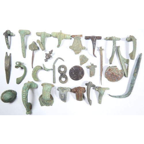 38 - Roman artefact group. Circa 1st-4th century CE. To include, many brooch types, stylus, ring bezel an... 