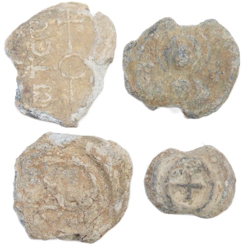 59 - Byzantine lead Bullae (document seals)(4). Circa 8th-10th century CE. Detailed with various letters,... 