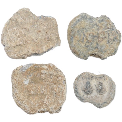 59 - Byzantine lead Bullae (document seals)(4). Circa 8th-10th century CE. Detailed with various letters,... 