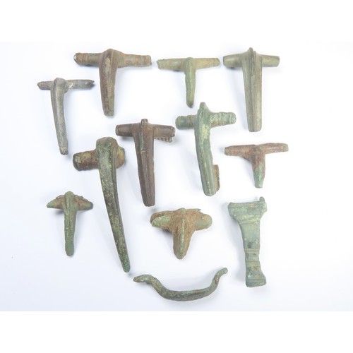 55 - Collection of Roman Brooches (12). Circa, 1st-4th century CE. Various types. Copper-alloy, 5g-14g. 2... 