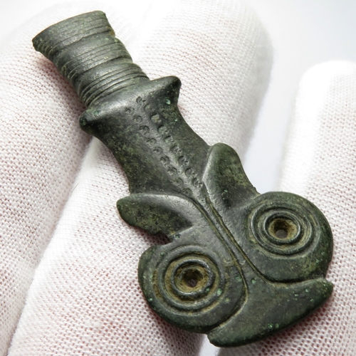 70 - Anglo-Saxon zoomorphic terminal. Foot from a copper alloy Anglo-Saxon cruciform brooch. The brooch h... 