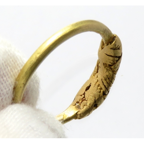 69 - Saxon period gold finger ring. Circa 8th-11th century CE. 2.50g, 19mm. A plain high carat band with ... 