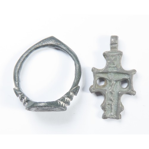 81 - Medieval Artefacts group (2). Circa 13th-15th century CE. Ring and cross pendantWeight:5.23g/4.43gSi... 