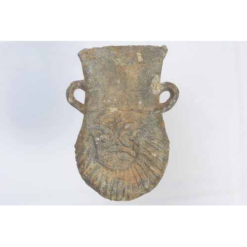 85 - Medieval pilgrims ampulla. Circa 15th century CE. Lead-alloy, 33.52g. 53mm. Pouch-shaped with suspen... 