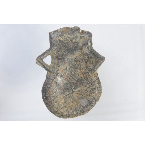 87 - Medieval pilgrims ampulla. Circa 15th century CE. Lead-alloy, 35.42g. 50mm. Pouch-shaped with suspen... 