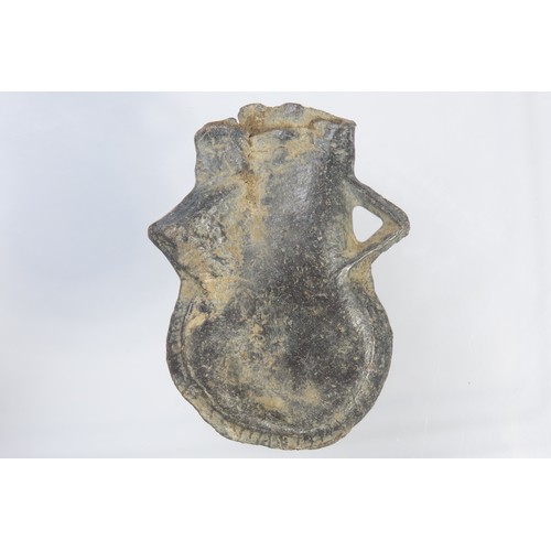 87 - Medieval pilgrims ampulla. Circa 15th century CE. Lead-alloy, 35.42g. 50mm. Pouch-shaped with suspen... 