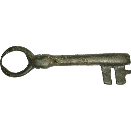 98 - Large medieval bronze key. Circa 14th century CE. Copper-alloy, 46.18g. 102mm. The key has a long ho... 