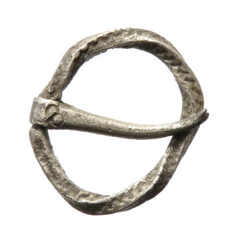 105 - Medieval silver annular brooch having a twisted frame with wrigglework decoration and a hinged pin f... 