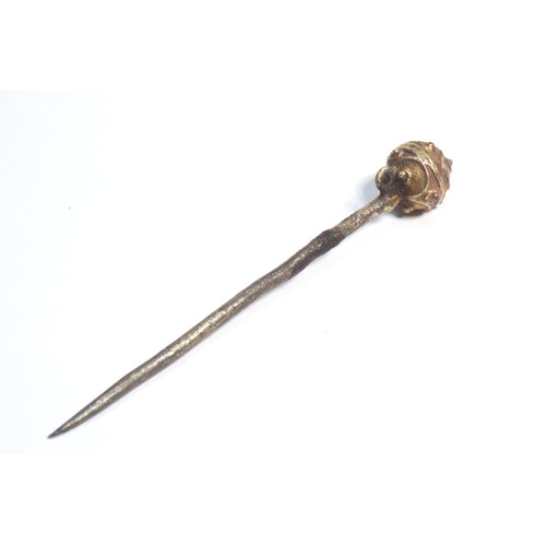 109 - Tudor silver gilt ball-headed dress pin. Circa 1500-1600 CE. 4.58g, 74mm. Each hemisphere is decorat... 