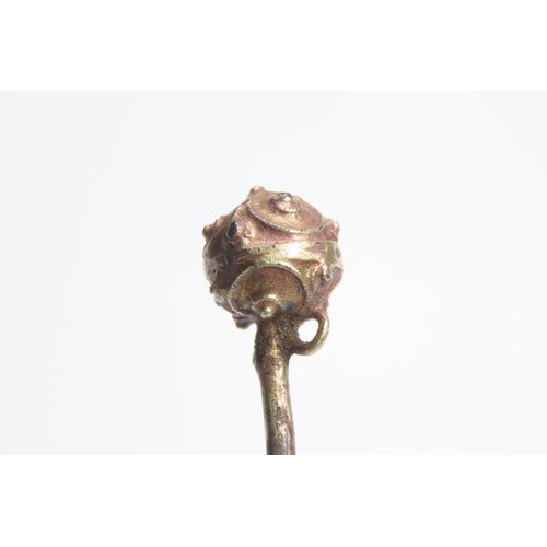 109 - Tudor silver gilt ball-headed dress pin. Circa 1500-1600 CE. 4.58g, 74mm. Each hemisphere is decorat... 