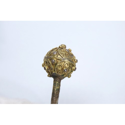 110 - Tudor silver gilt ball-headed dress pin. Circa 1500-1600 CE. 6.09g, 98mm. Each hemisphere is decorat... 