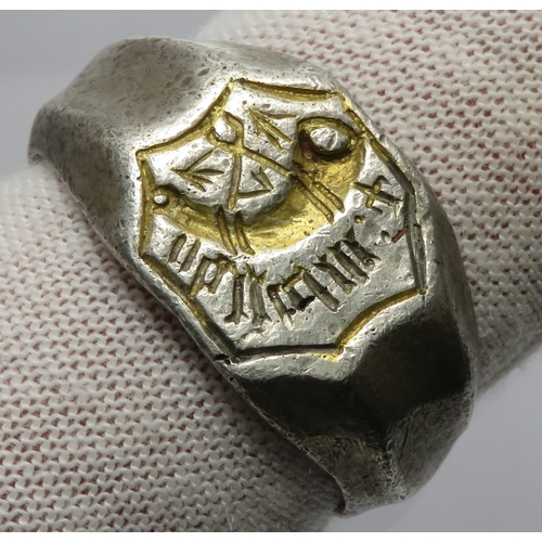 108 - Medieval silver gilt signet finger ring. Circa 14th-15th century CE. 13.9g, 25mm; UK ring size M. An... 