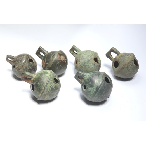 122 - Group of post medieval crotal bells. Circa 18th century. 23.41g-44.31g. 35mm-38mm. A collection of b... 