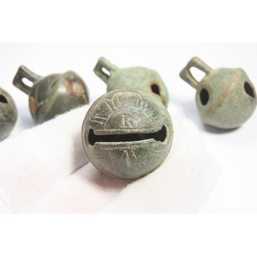 122 - Group of post medieval crotal bells. Circa 18th century. 23.41g-44.31g. 35mm-38mm. A collection of b... 