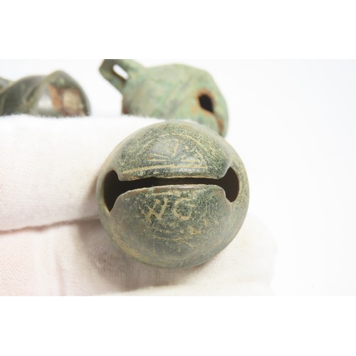 122 - Group of post medieval crotal bells. Circa 18th century. 23.41g-44.31g. 35mm-38mm. A collection of b... 