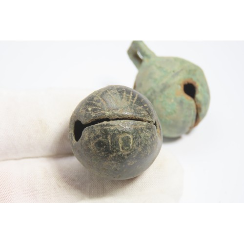 122 - Group of post medieval crotal bells. Circa 18th century. 23.41g-44.31g. 35mm-38mm. A collection of b... 