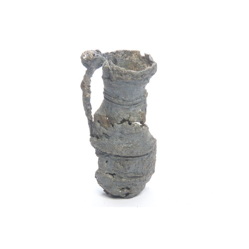 124 - Medieval pewter minature baluster jug. Circa 12th-13th century CE. A Thames foreshore find complete ... 