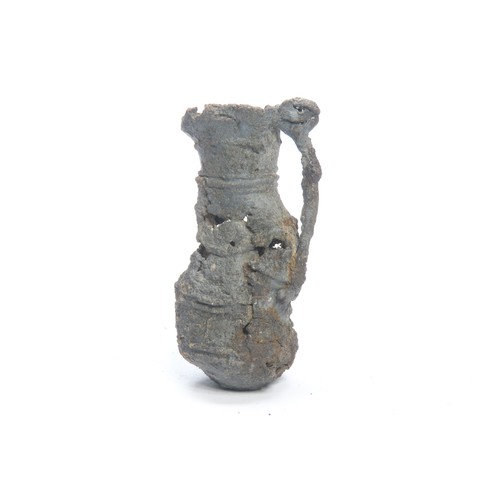 124 - Medieval pewter minature baluster jug. Circa 12th-13th century CE. A Thames foreshore find complete ... 