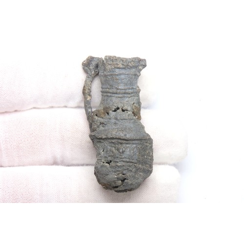 124 - Medieval pewter minature baluster jug. Circa 12th-13th century CE. A Thames foreshore find complete ... 