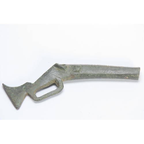 125 - 17th Century Toy Musket. Copper-alloy, 18g. 75mm. Cast in one piece with  fishtail butt, faceted bar... 