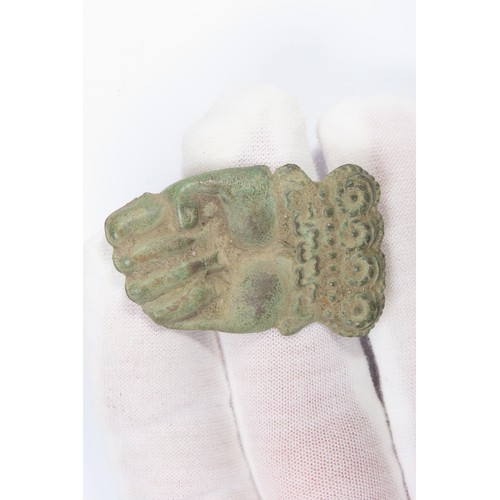 128 - 17th / 18th century repouse badge in the form of a fist with lace cuff. Possibly a livery or retaine... 