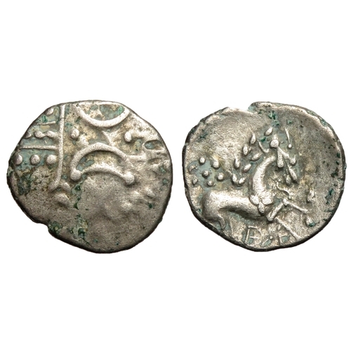 148 - Iceni ECEN stepping horse silver unit. Circa 10-43 AD. Back to back crescents over vertical wreath. ... 