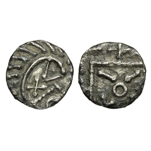 311 - Series E sceat. Continental series, circa 695-740 AD. Silver, 11mm. 0.83g. Degenerate head  enclosin... 