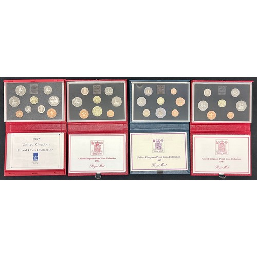 512 - Royal Mint, Proof Coin Collections. 1983,1986,1987,1992, United Kingdom Proof Coin Collection.