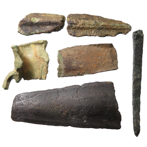 15 - Bronze age artefact group. Incomplete objects including pieces of sword blade, spearhead and axe. La... 