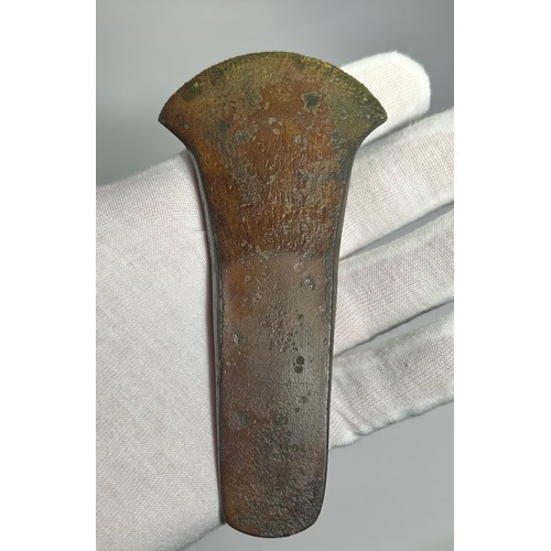 7 - Early Bronze Age decorated flat axe. Circa 2000-1900BC. Copper-alloy, 120mm x 58mm. An exceptional e... 