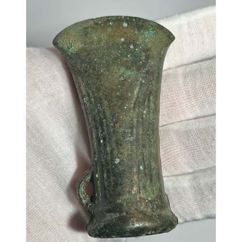 12 - Late Bronze Age looped and socketed axe head. Circa 1000-800 BCE. Copper-alloy, 86mm x 49mm. Detaile... 