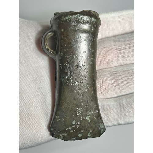 16 - Bronze Age loop and socketed axe head. Circa 1000-800 BCE. Late Bronze Age, Ewart Park phase. Copper... 