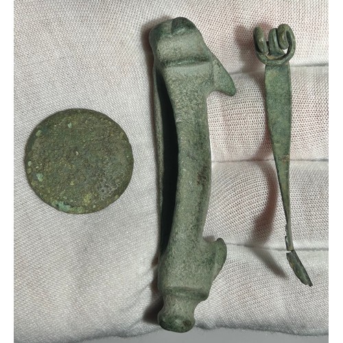 27 - Iron Age & Roman artefacts (3). Circa 1st century CE. To include a La Tene, type III one piece b... 