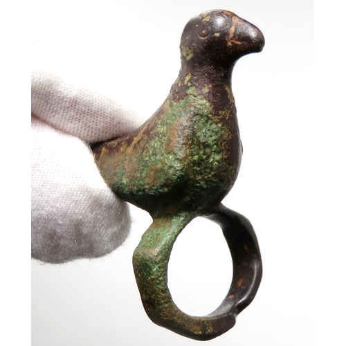 22 - Iron age zoomorphic vessel mount. Circa 1st century BCE - 1st century CE. A stylised bird with integ... 