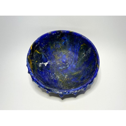 29 - Eastern Mediterranean. Graeco-Roman moulded glass bowl. Circa 1st century BCE–CE 1st century. Dark b... 