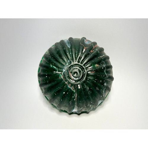 31 - Eastern Mediterranean. Graeco-Roman moulded glass bowl. Circa 1st century BCE–CE 1st century. Dark g... 